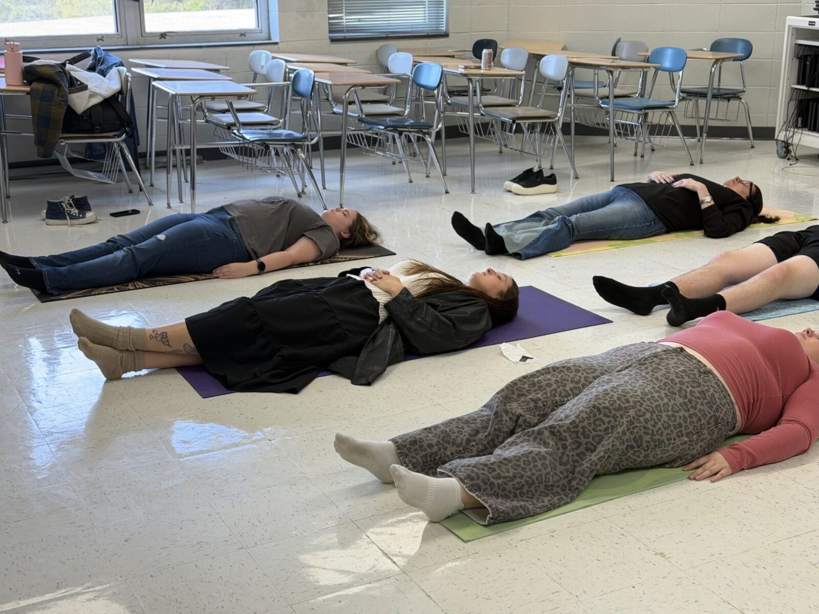 Polk High School Bigs practice mindfulness and meditation with yoga instructor Jenni Bradley.