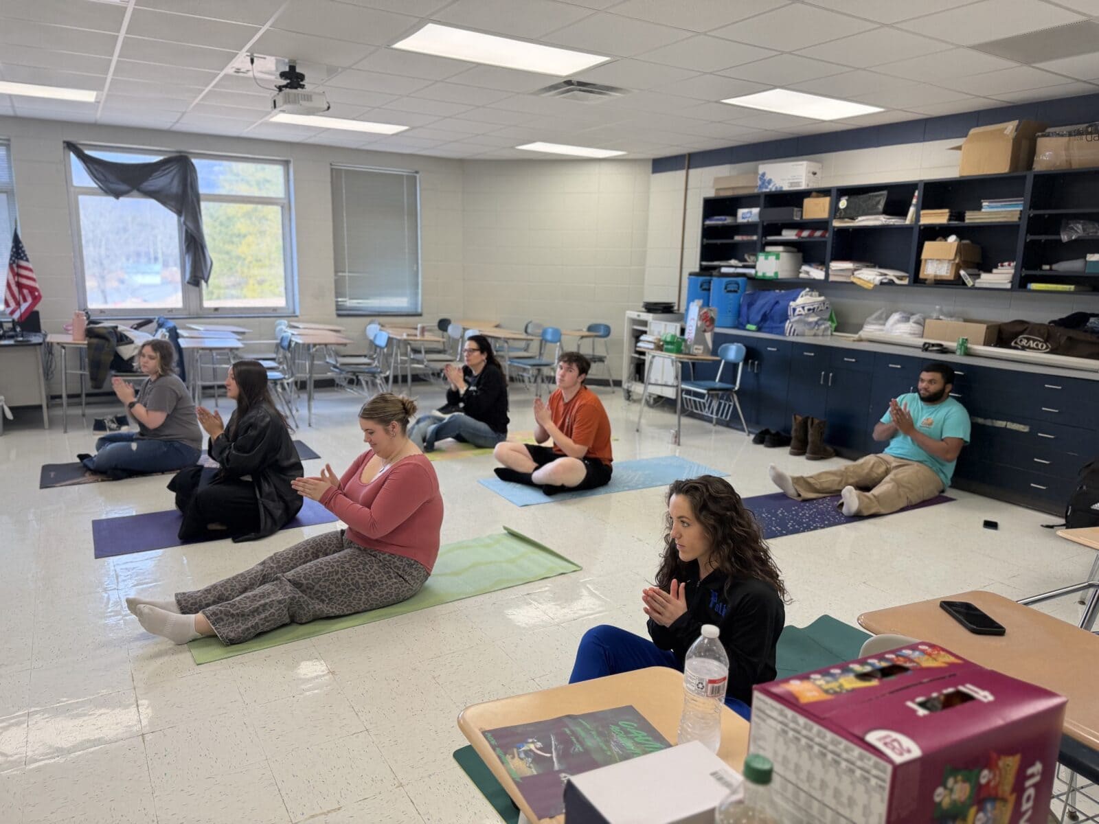 Polk High School Bigs practice mindfulness and meditation with yoga instructor Jenni Bradley.